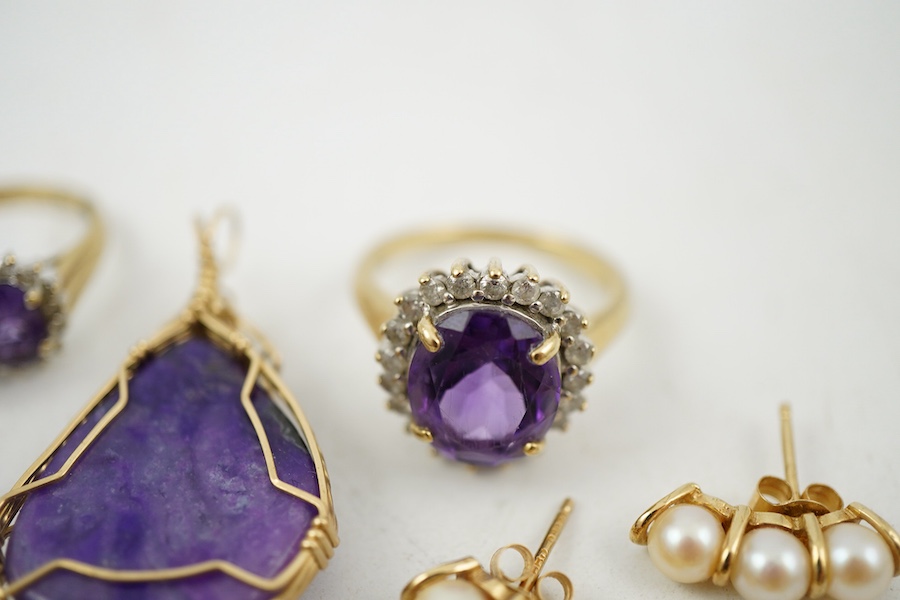 A collection of jewels, comprising: two amethyst and diamond rings; a cultured pearl and circular-cut sapphire wreath brooch; a fire opal pendant, one stone deficient; and a pair of cultured pearl earrings, all mounted i
